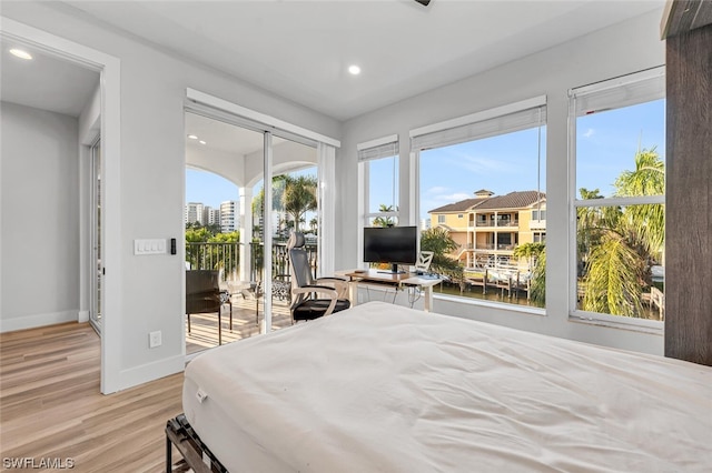 bedroom with light hardwood / wood-style floors