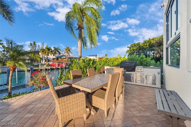 view of patio / terrace with a water view