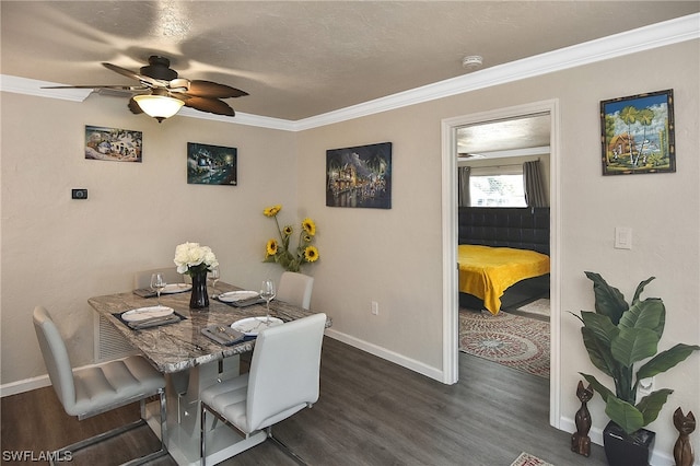 dining space featuring a textured ceiling, dark hardwood / wood-style flooring, ceiling fan, and ornamental molding