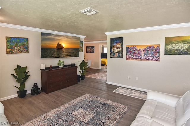 living room featuring a textured ceiling, crown molding, and dark wood-type flooring