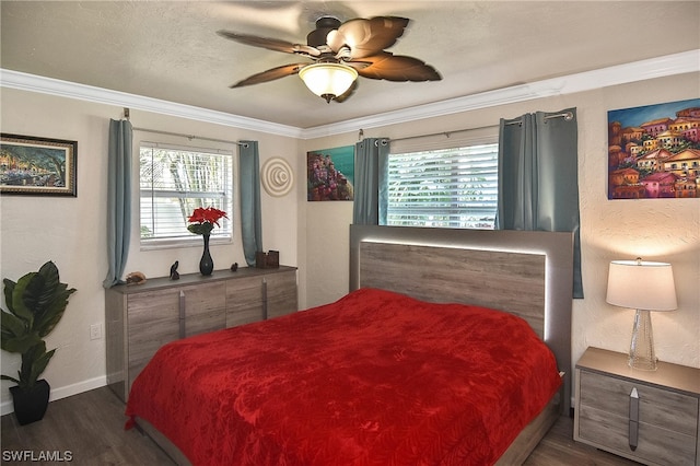 bedroom featuring multiple windows, ceiling fan, crown molding, and dark wood-type flooring