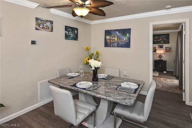 dining space featuring dark hardwood / wood-style floors, ceiling fan, and crown molding