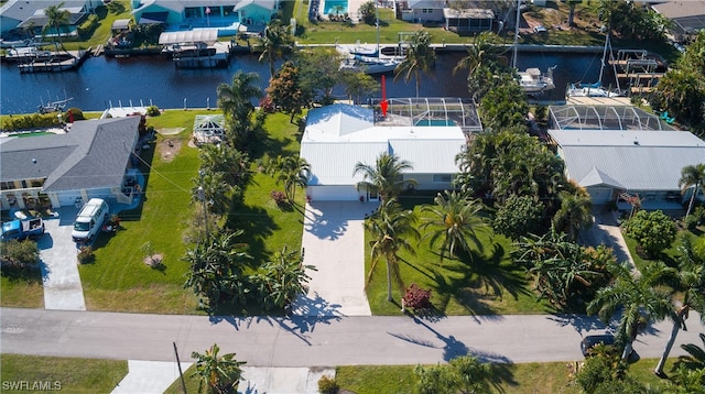 drone / aerial view featuring a water view