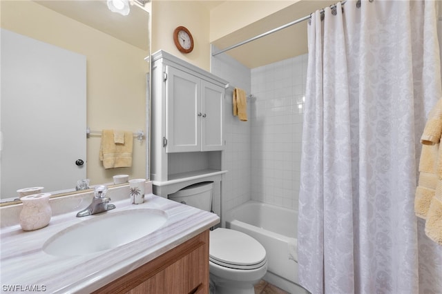 full bathroom featuring toilet, shower / tub combo, and vanity