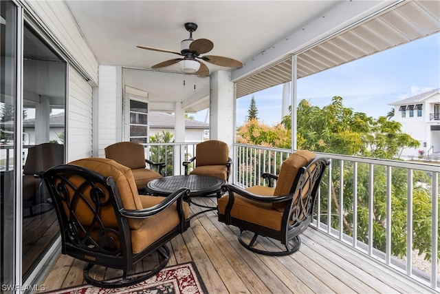 exterior space with ceiling fan