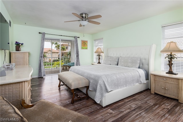 bedroom featuring dark wood-type flooring, ceiling fan, and access to outside