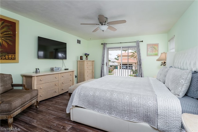 bedroom with dark wood-type flooring, ceiling fan, and access to outside