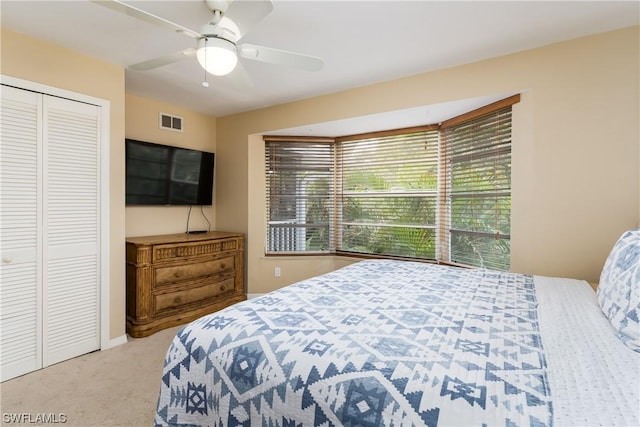 832 Swan Dr, Marco Island, FL 34145 - bedroom with visible vents, ceiling fan, a closet, and carpet