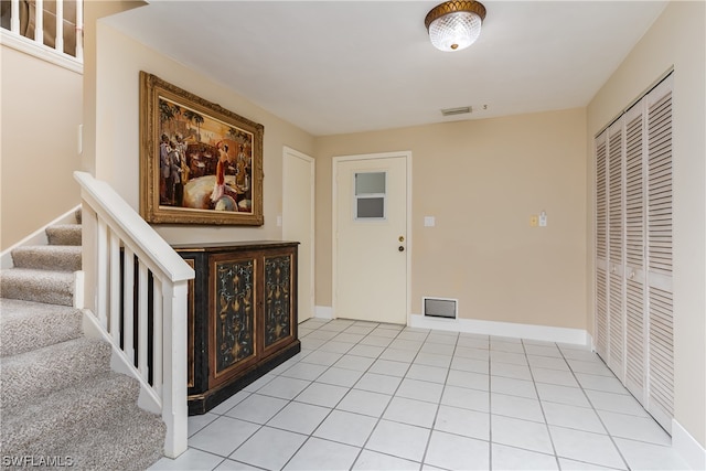 interior space featuring light tile floors