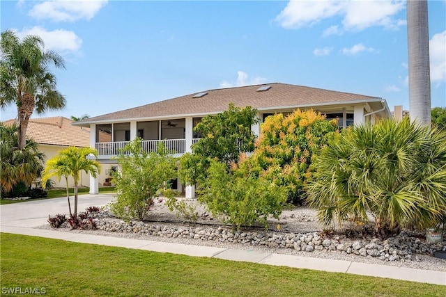 832 Swan Dr, Marco Island, FL 34145 - view of front of home featuring concrete driveway and a ceiling fan