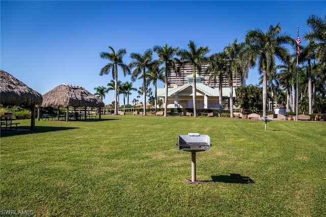 view of property's community featuring a lawn and a gazebo