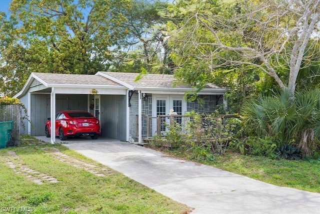 single story home with a carport