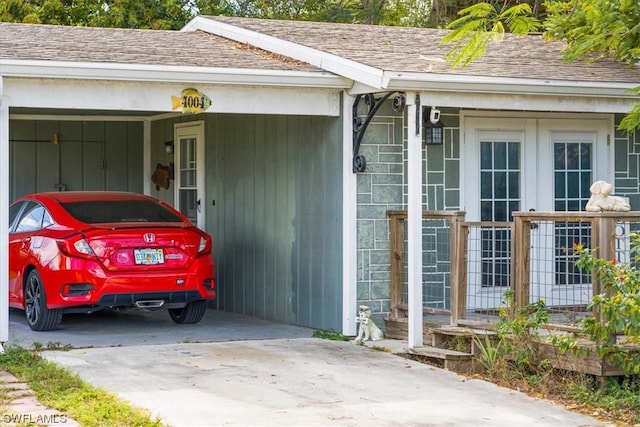 exterior space with a carport