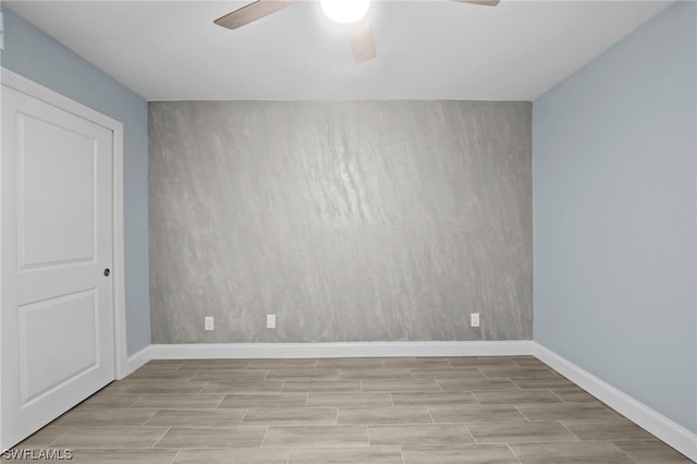 empty room featuring ceiling fan