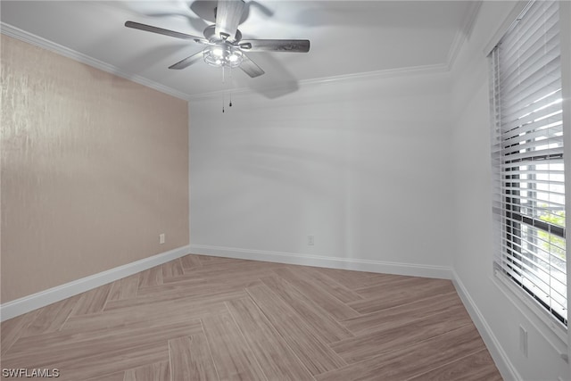 spare room with light parquet floors, crown molding, and ceiling fan