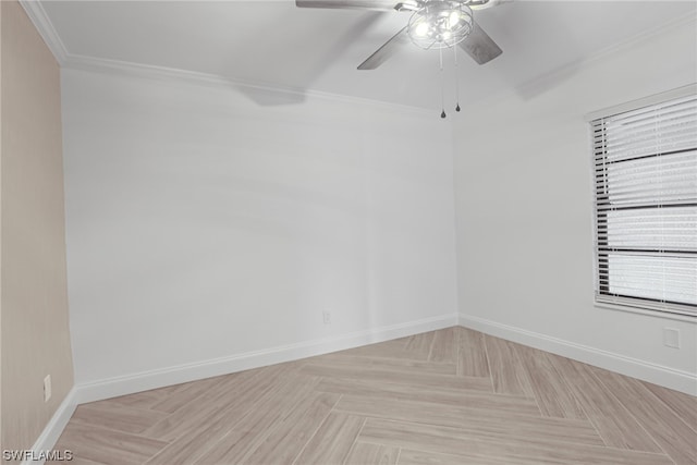 unfurnished room featuring light parquet floors, ornamental molding, and ceiling fan