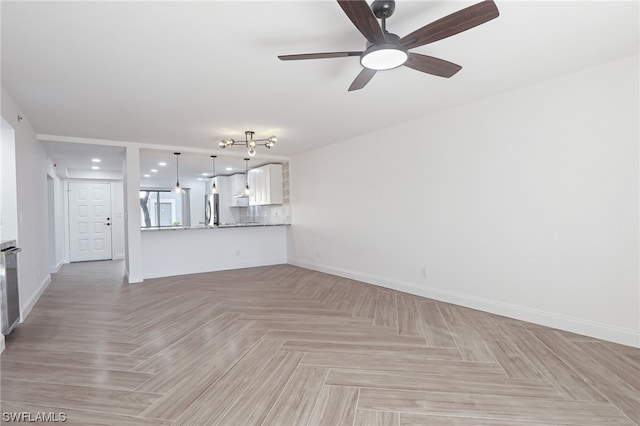 unfurnished living room featuring light parquet floors and ceiling fan