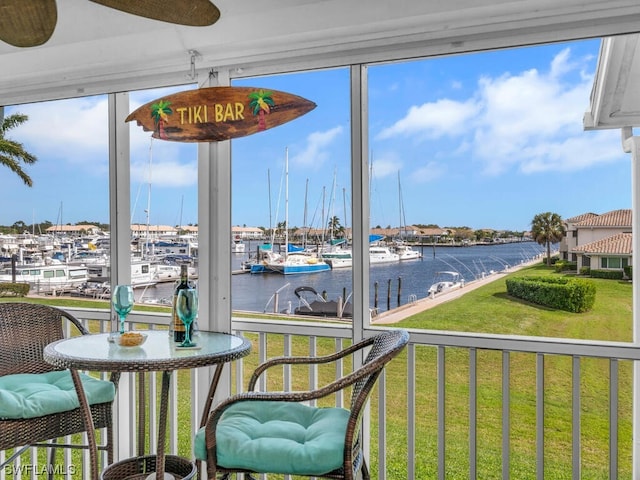 sunroom with a water view