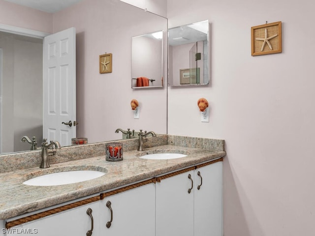 bathroom featuring double vanity