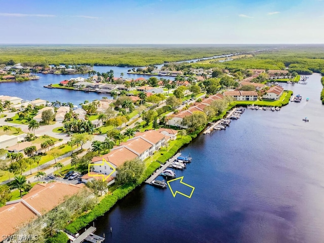 drone / aerial view featuring a water view