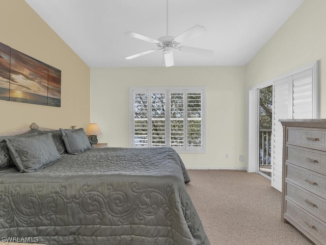 carpeted bedroom with vaulted ceiling, ceiling fan, access to outside, and multiple windows