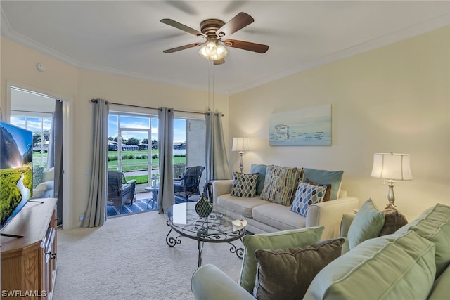 living room with light carpet, ornamental molding, and ceiling fan