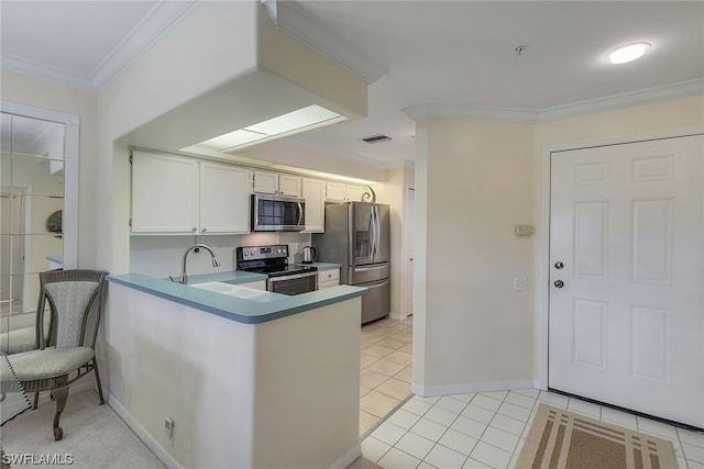 kitchen featuring kitchen peninsula, white cabinetry, light tile flooring, appliances with stainless steel finishes, and sink