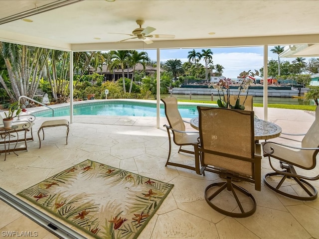 view of pool featuring a patio area and ceiling fan