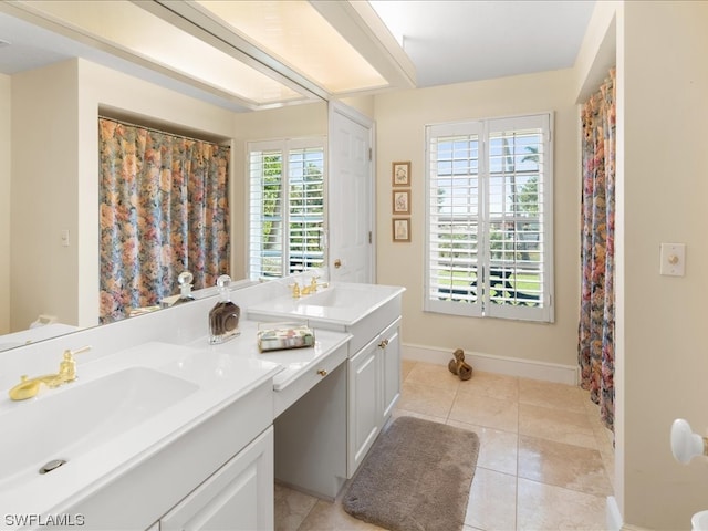 bathroom with double sink vanity and tile floors