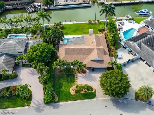 drone / aerial view with a water view