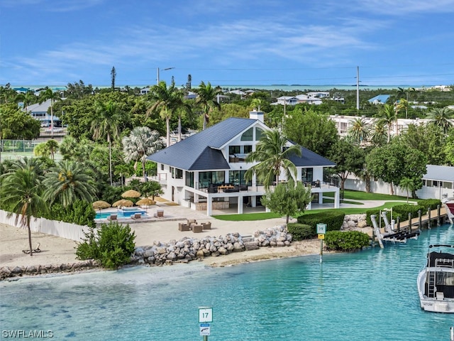 exterior space with a water view