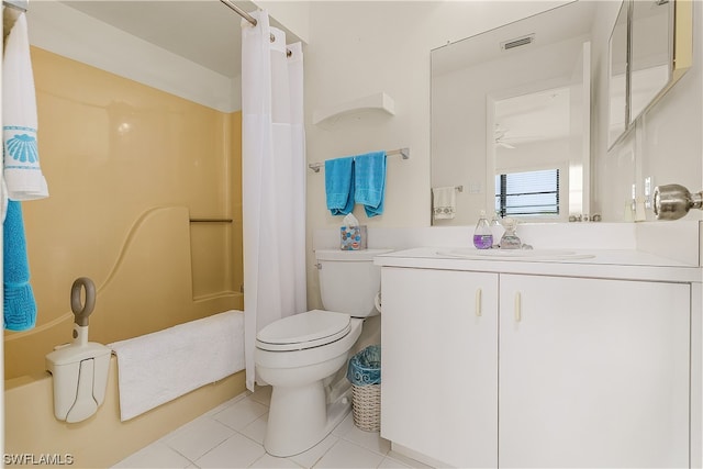 bathroom featuring tile floors, oversized vanity, ceiling fan, and toilet