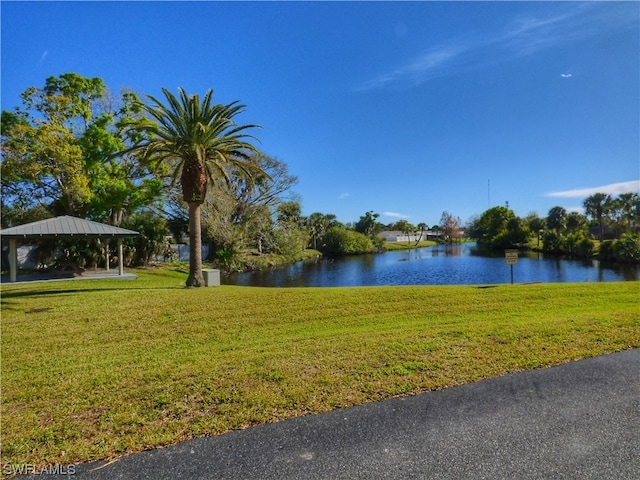 property view of water with a gazebo