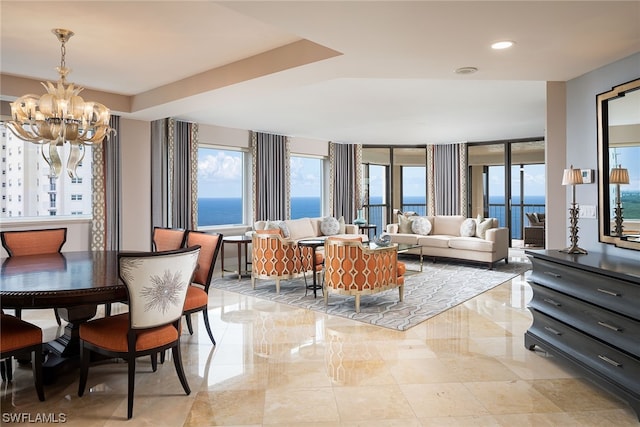 interior space with a water view and an inviting chandelier