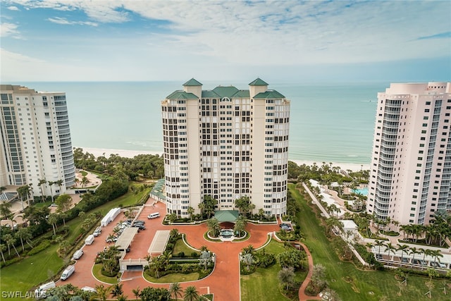 birds eye view of property with a water view