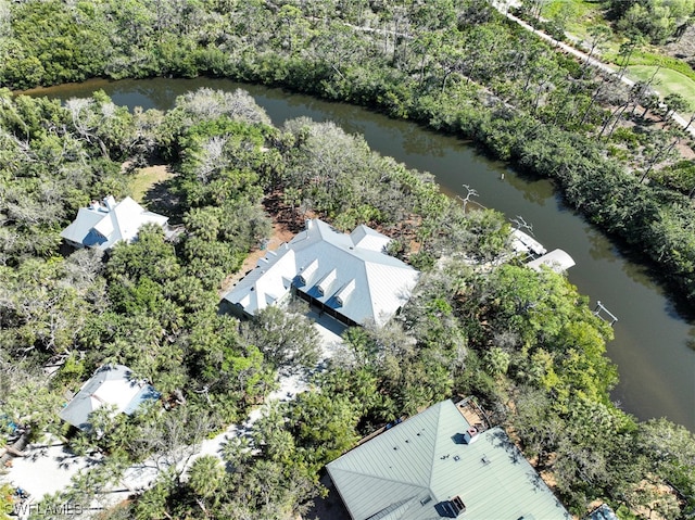 drone / aerial view with a water view