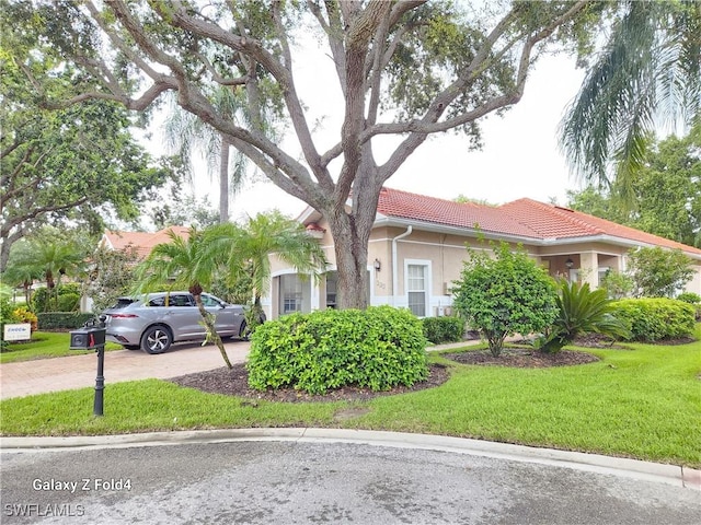 view of front of home with a front yard