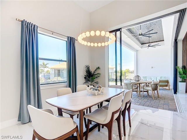 dining area featuring ceiling fan