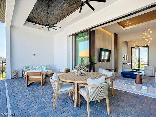 view of patio / terrace with ceiling fan and outdoor lounge area