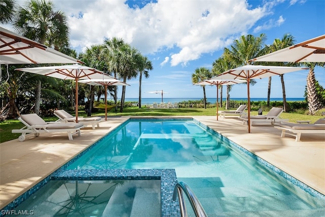 view of swimming pool with a patio