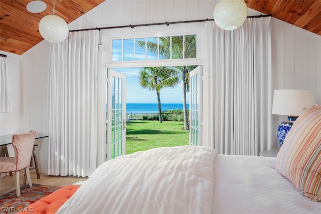 bedroom with access to exterior, a water view, vaulted ceiling, and wooden ceiling