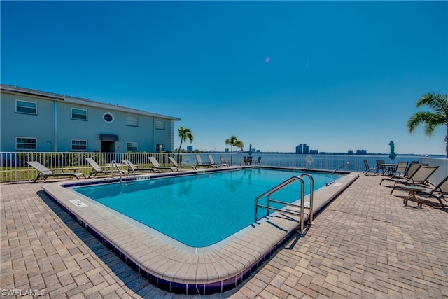 view of pool featuring a patio