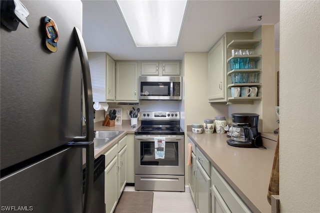 kitchen with black appliances and sink