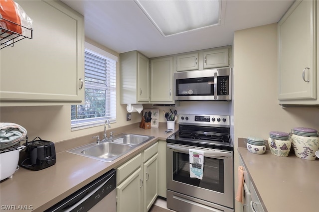 kitchen featuring appliances with stainless steel finishes and sink