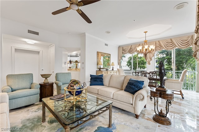 living room featuring ceiling fan with notable chandelier and ornamental molding