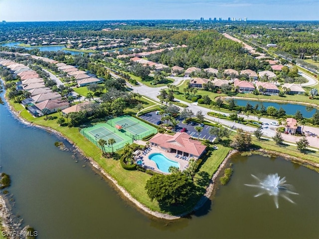 bird's eye view with a water view