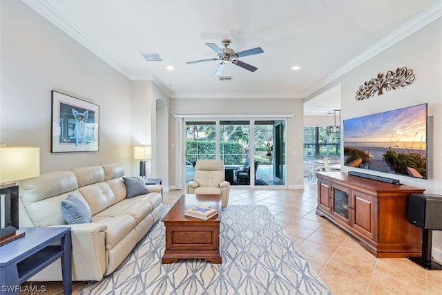 living room with light tile floors, crown molding, and ceiling fan