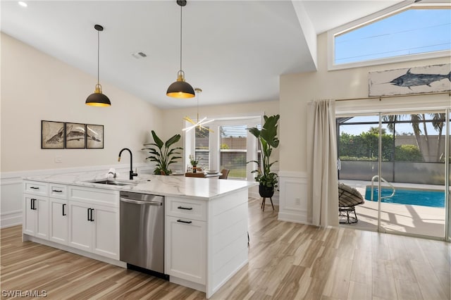 kitchen with white cabinetry, dishwasher, a healthy amount of sunlight, and light wood-type flooring