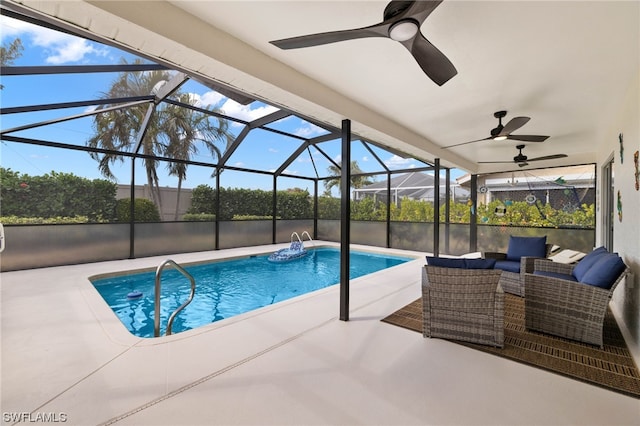 view of swimming pool with a lanai, a patio area, an outdoor living space, and ceiling fan