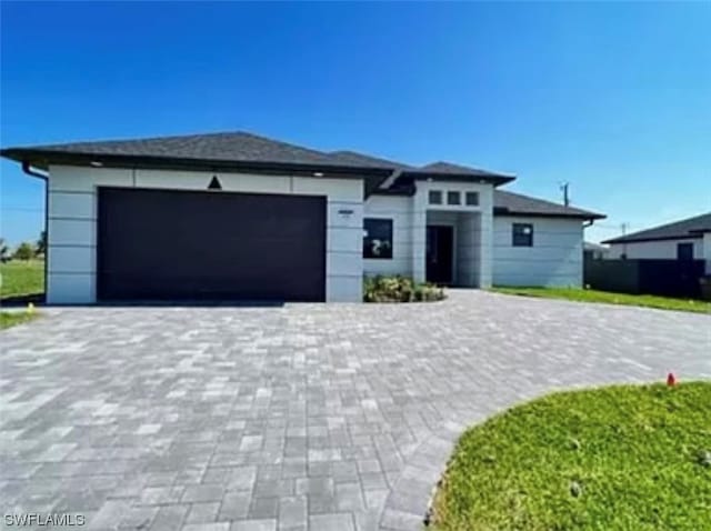 view of front of property with a garage